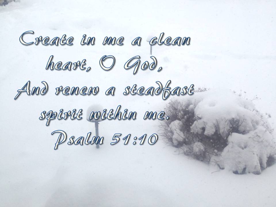 A snowy landscape with a quote from Psalm 51:10 written in elegant font: 'Create in me a clean heart, O God, And renew a steadfast spirit within me.'